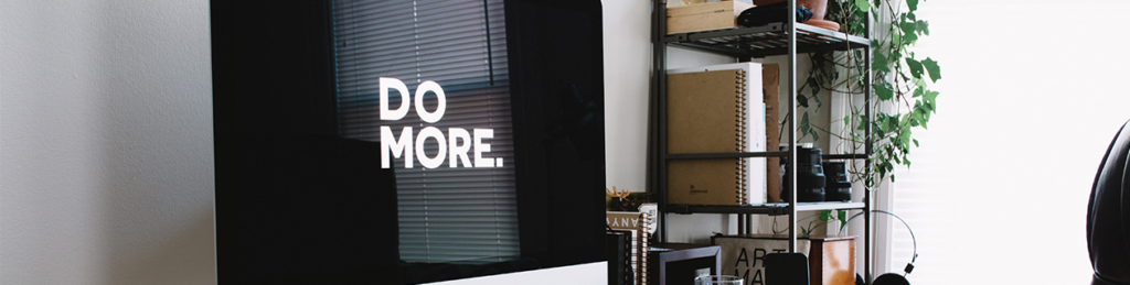 Quitting your job? A home office "Do More." is writing on computer screen